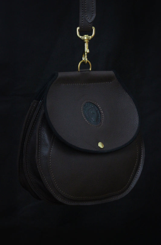 Falconry bag in dark brown with black trim
