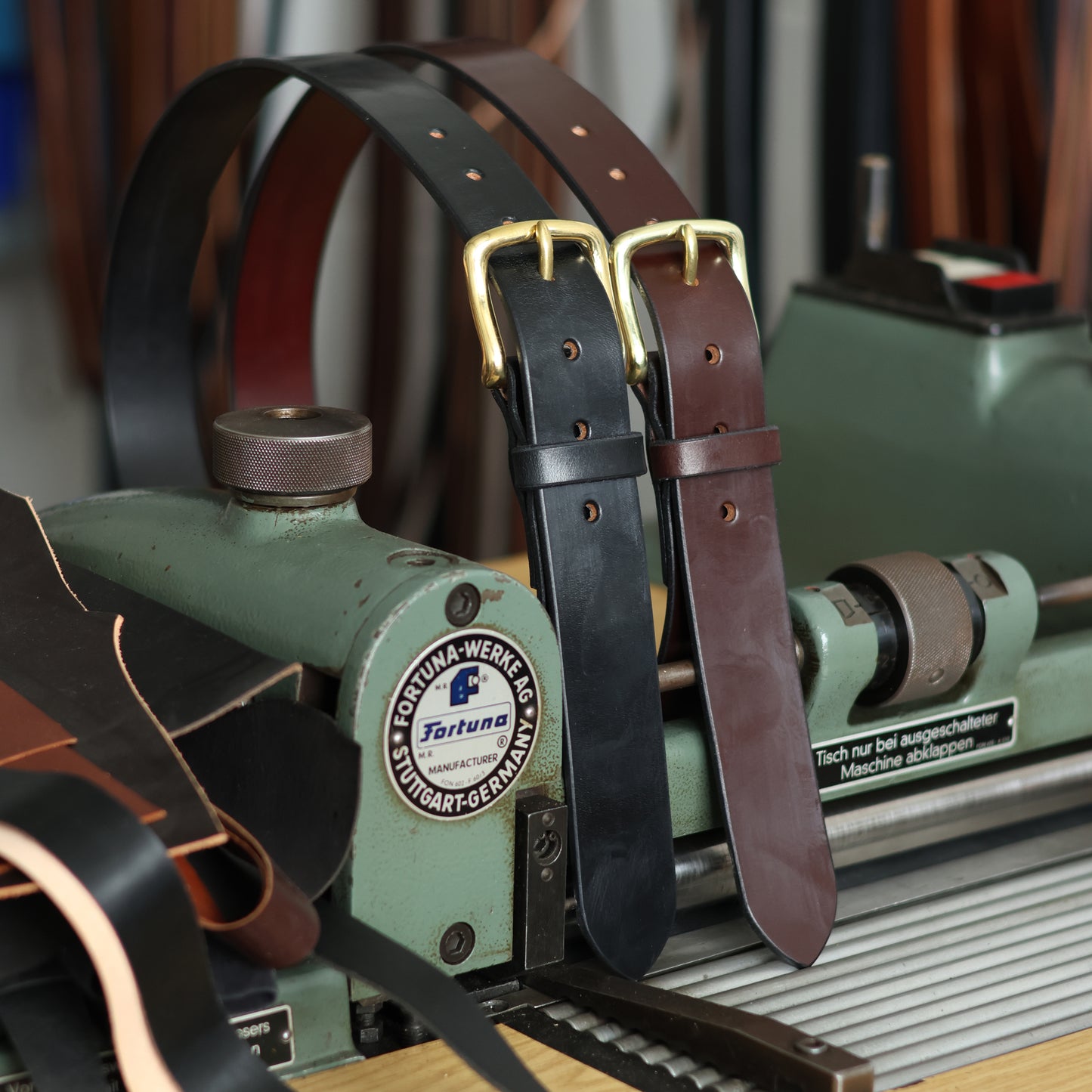 Bridle leather belts in Australian Nut  and black with brass buckles
