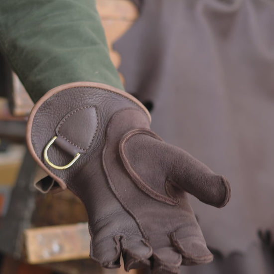 Double thickness falconry glove on the hand