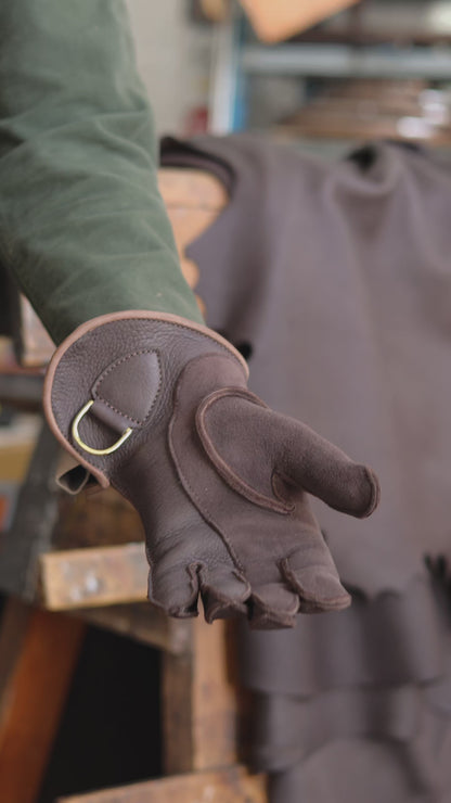 Double thickness falconry glove on the hand